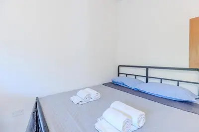 Letto o letti in una camera di Solskin Apartment - A due passi dal Lungomare -