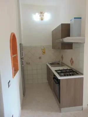 Cucina o angolo cottura di Appartamenti Budoni
