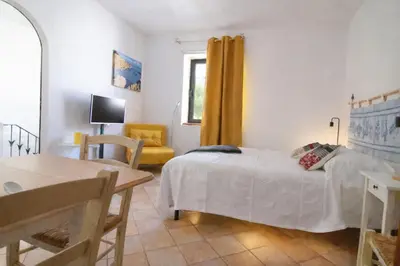 Letto o letti in una camera di Domo Fadda Orosei