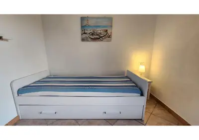 Letto o letti in una camera di Casetta Milù