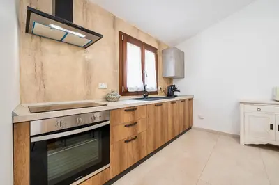 Cucina o angolo cottura di Villa with private pool in San Teodoro just few minutes from La Cinta - beach