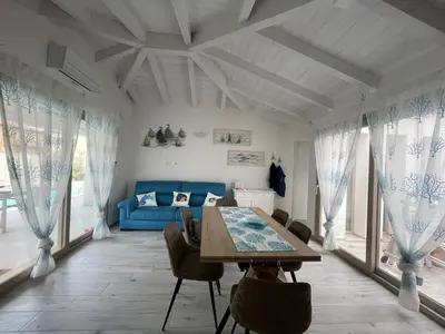 Letto o letti in una camera di Villa Maluva Budoni