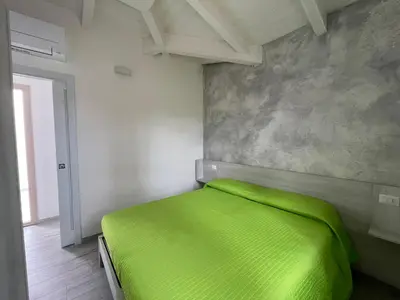 Letto o letti in una camera di Villa Maluva Budoni