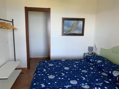 Letto o letti in una camera di Villino Caddu