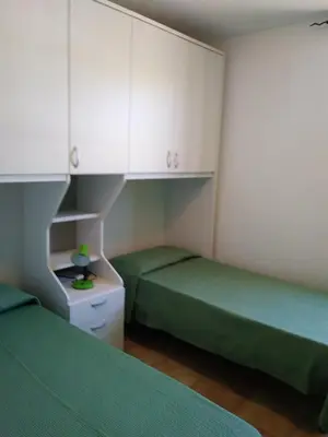 Letto o letti in una camera di Casa Su Lizzu