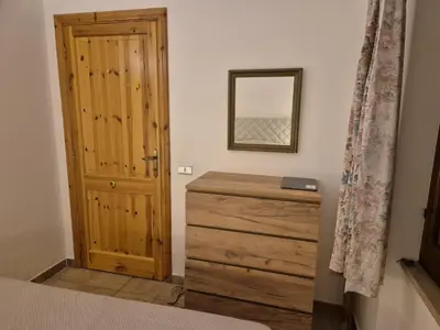 Letto o letti in una camera di Villa Rosmarino