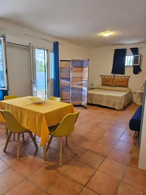 Letto o letti in una camera di Casa Elicriso