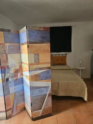 Letto o letti in una camera di Casa Elicriso