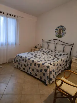 Letto o letti in una camera di Casa Miranda Three-room apartment with a terrace overlooking the sea