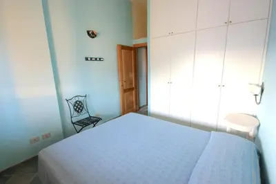 Letto o letti in una camera di Smeraldo - Lovely apartment for vacation