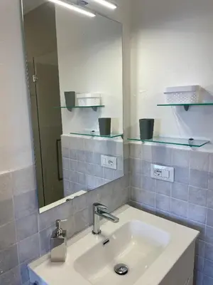 Bagno di Villaggio Est 2 camere con Giardino Vista Mare