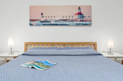 Letto o letti in una camera di Marineledda appartamento Belvedere