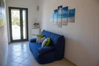 Area soggiorno di La Pavoncella Marina - Cozy home near Porto Taverna
