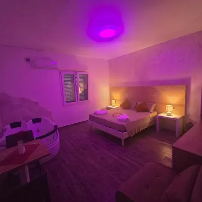 Letto o letti in una camera di Miluna Affittacamere