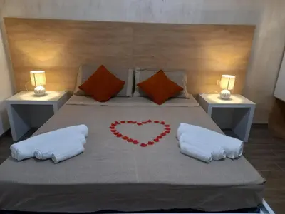 Letto o letti in una camera di Miluna Affittacamere