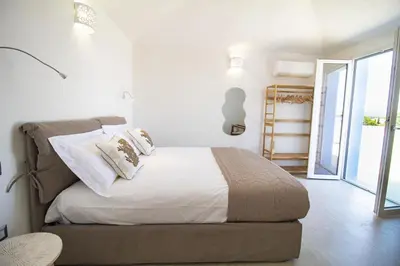 Letto o letti in una camera di Borgo Bianco affittacamere