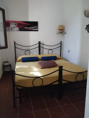 Letto o letti in una camera di Da Laura