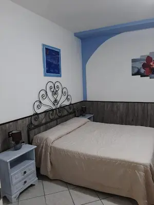 Letto o letti in una camera di Conchiglie 7