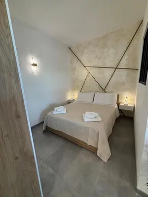Letto o letti in una camera di Beddi Apartments A