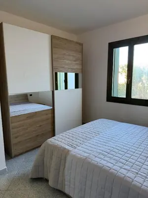 Letto o letti in una camera di Borgata Lu Fraili