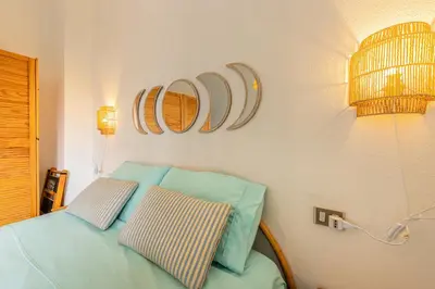 Letto o letti in una camera di Terrazza porto San Paolo
