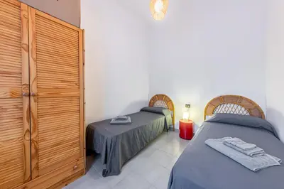 Letto o letti in una camera di Terrazza porto San Paolo