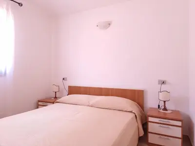 Letto o letti in una camera di La Minda di Supra - Budoni Sweet Home