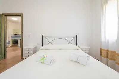 Letto o letti in una camera di AffittaSardegna - Trilo Euforbia