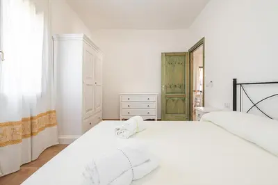 Letto o letti in una camera di AffittaSardegna - Trilo Euforbia