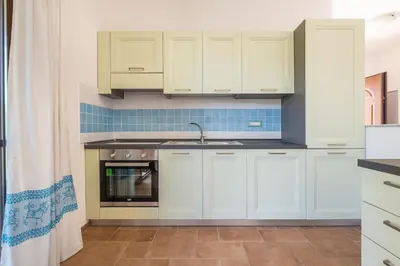 Cucina o angolo cottura di AffittaSardegna - Trilo Euforbia