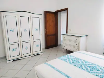 Letto o letti in una camera di La Pavoncella