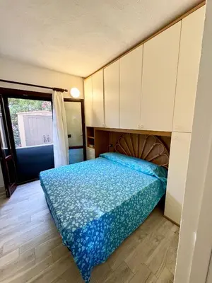 Letto o letti in una camera di Casa vacanza Gramsci - 900mt dalla spiaggia