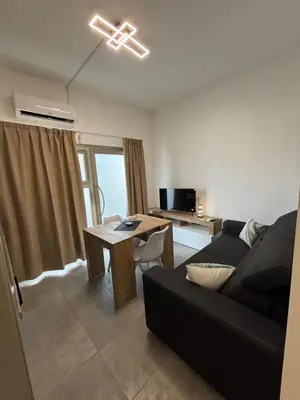 Area soggiorno di Beddi Apartments B