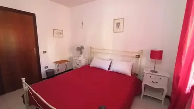 Letto o letti in una camera di Casa Artude