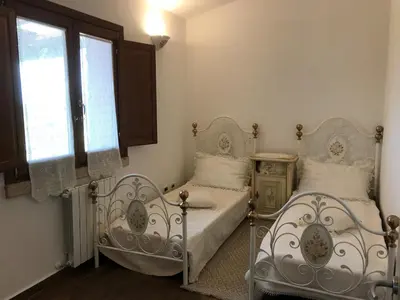 Letto o letti in una camera di Stazzo Gallurese con vista sul golfo di Olbia