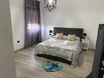 Letto o letti in una camera di Suite Apartment