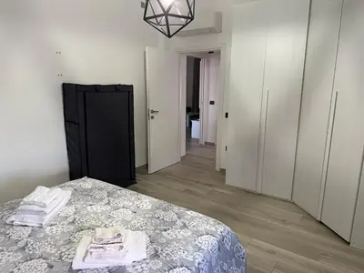 Letto o letti in una camera di Suite Apartment