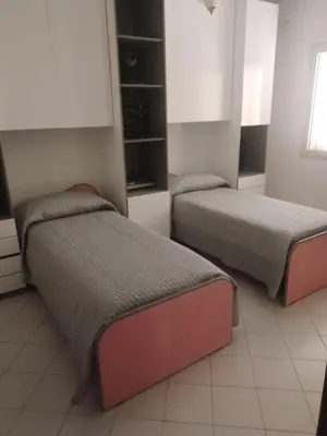 Letto o letti in una camera di Casa di lella
