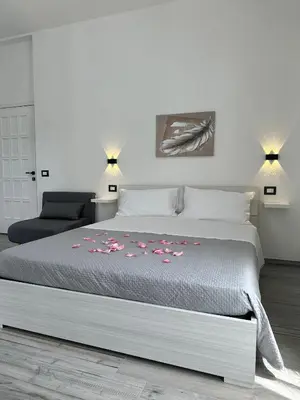 Letto o letti in una camera di B&B Magiulsà