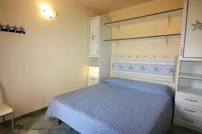 Letto o letti in una camera di Diana
