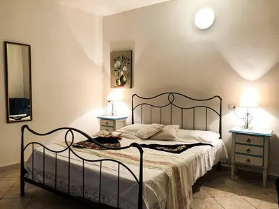 Letto o letti in una camera di CAMERA ECONOMY Piano Strada, Sas Tilibbas , Ammentos