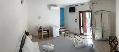 Letto o letti in una camera di CAMERA ECONOMY Piano Strada, Sas Tilibbas , Ammentos