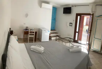 Letto o letti in una camera di CAMERA ECONOMY Piano Strada, Sas Tilibbas , Ammentos