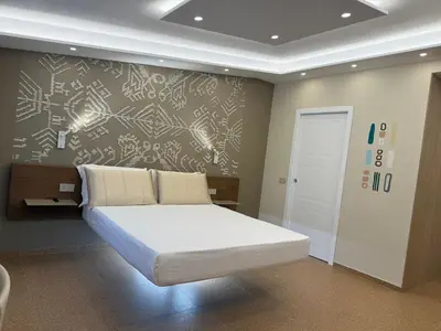 Letto o letti in una camera di MIRARI Design Rooms