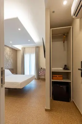 Letto o letti in una camera di MIRARI Design Rooms