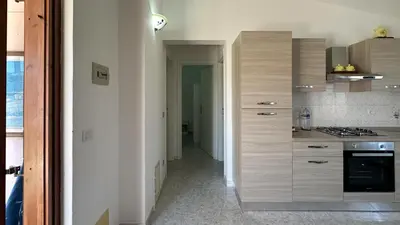 Cucina o angolo cottura di La Casa di Anna - Trilocale 6 posti letto San Teodoro
