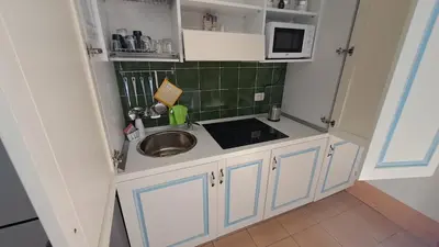 Cucina o angolo cottura di Domu Joy - Appartamento - Prima Spiaggia