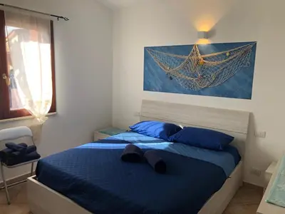 Letto o letti in una camera di Sa Onda