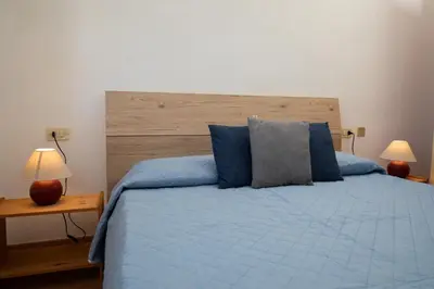 Letto o letti in una camera di Terrazza su Tavolara by Wonderful Italy