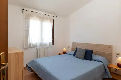 Letto o letti in una camera di Terrazza su Tavolara by Wonderful Italy